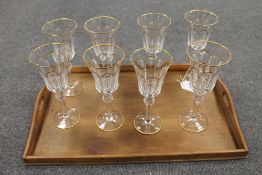 A set of seven Faberge gilded crystal wine glasses, height 22 cm. (8) CONDITION REPORT: Good