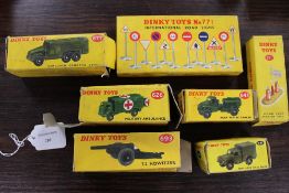 A Dinky Toys No.771 International Road Sign set, together with Petrol pump 781 and five military