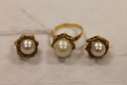 A pair of continental yellow metal pearl earrings, together with the matching dress ring. (3)
