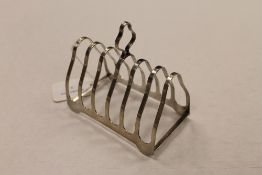 A silver toast rack, Birmingham 1939. CONDITION REPORT: Good condition.