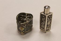 A Chinese silver flask, indistinctly marked, height 7 cm, together with a glass lined silver  salt