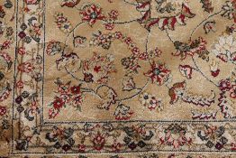 A Kashmir fringed rug with floral design