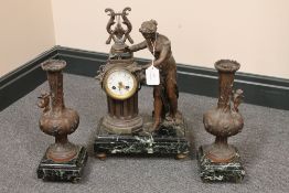 A three piece marble and spelter clock s