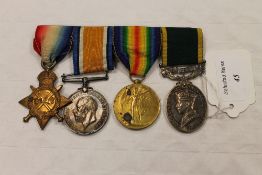 A group of four WW I medals to 2nd Lieut. E. Carr, on suspension ribbons and bar. CONDITION
