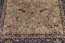 A Kashmir fringed rug with muticoloured