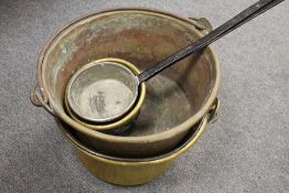 Two vintage long handled pans, together with two large brass jam pans. (4) CONDITION REPORT: Good