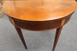 A Georgian inlaid mahogany card table, on square tapered legs, width 93 cm.