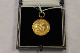 A 9ct gold National Joint Industrial Council for the Flour Milling Industry, 9.2g, cased.