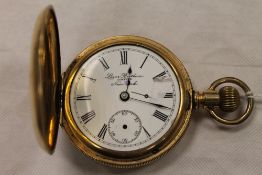 A 14ct gold half hunter pocket watch by Lever Brothers, New York. CONDITION REPORT: Fair
