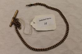 A 9ct gold watch chain, 29g. CONDITION REPORT: Good condition, with a gilt metal T-bar attached.
