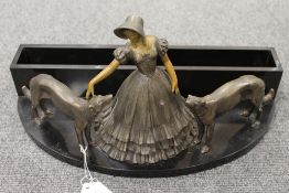 A French Art Deco desk stand with patinated spelter figure of a lady and two lurchers,  width 43.5