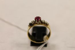 A 14ct gold ruby ring. CONDITION REPORT: Good condition.