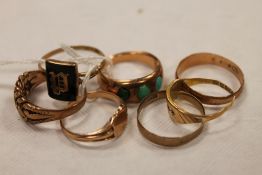 A 9ct gold mourning ring, together with a turquoise set ring and five other 9ct gold rings. (7)