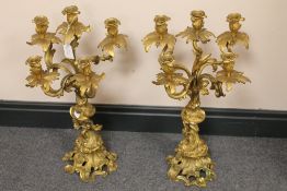 A pair of gilt bronze rococo style cande