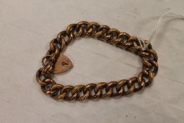 A 9ct gold bracelet with heart clasp, 17.9g. CONDITION REPORT: Good condition, each link with some