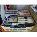 COLLECTION OF CASSETTE TAPES AND VINTAGE SINGLES