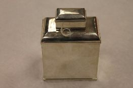 A silver tea caddy, London 1928, 11 cm, 5.3 oz. CONDITION REPORT: Good condition, mark a little