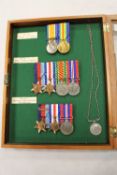 A collection of medals to include two WW I medals awarded to 16889D.A G.Fawcus D.H. R.N.R, also