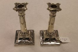 A pair of silver classical style candlesticks, London 1896, height 18.5 cm, 35 oz. (2) CONDITION