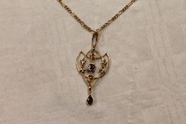 A 9ct gold Edwardian pendant on necklace, 5.8g. CONDITION REPORT: Good condition, the yellow metal