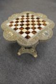 A fine nineteenth century Vizagapatam ivory and tortoiseshell chess table, height 22 cm. CONDITION