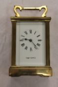 A Mappin & Webb brass carriage clock, height 11.5 cm. CONDITION REPORT: Good condition, minor wear
