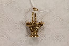 A 9ct gold floral basket charm, 7g. CONDITION REPORT: Good condition.