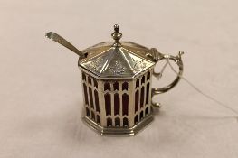 A Victorian gothic silver mustard pot with ruby glass liner, London 1852. CONDITION REPORT: Maker'