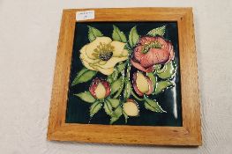 A Moorcroft tile, 20 cm x 20 cm, framed. CONDITION REPORT: Unexamined out of the frame, the
