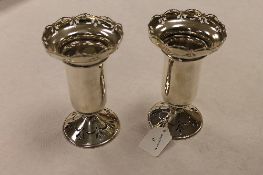 A pair of silver vases, Birmingham 1912/13, height 18 cm, 15 oz. (2) CONDITION REPORT: Good