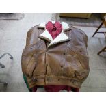 BURBERRY RED SHIRT SIZE LARGE TOGETHER WITH A LEATHER JACKET WITH SHEEPSKIN LINING