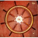 Marine. Large ship’s wheel in wood with