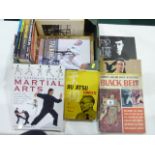 Martial Arts.   A carton.