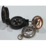 Two military issue pocket compass, the s