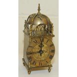 Reproduction lantern clock with French l