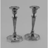 Pair of silver table candlesticks with f