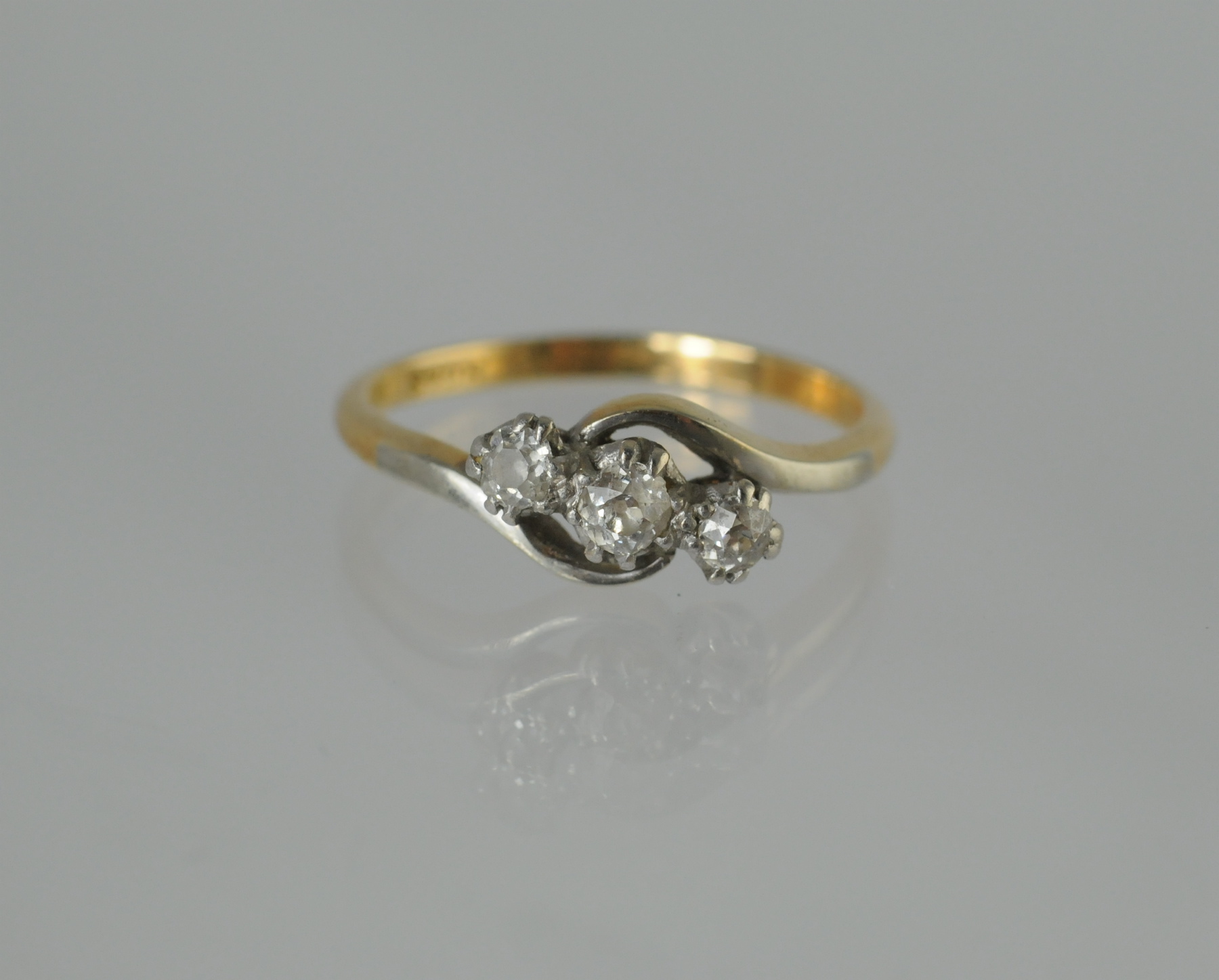 Diamond three stone cross over ring, old