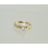 Diamond solitaire ring with ribbed shoul