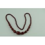 Pressed amber bead necklet.