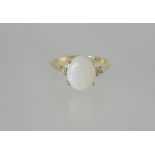 Ring with oval opal & diamond set should