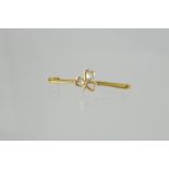 Gold brooch with rose diamond shamrock,