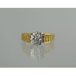 Diamond solitaire ring with textured sho