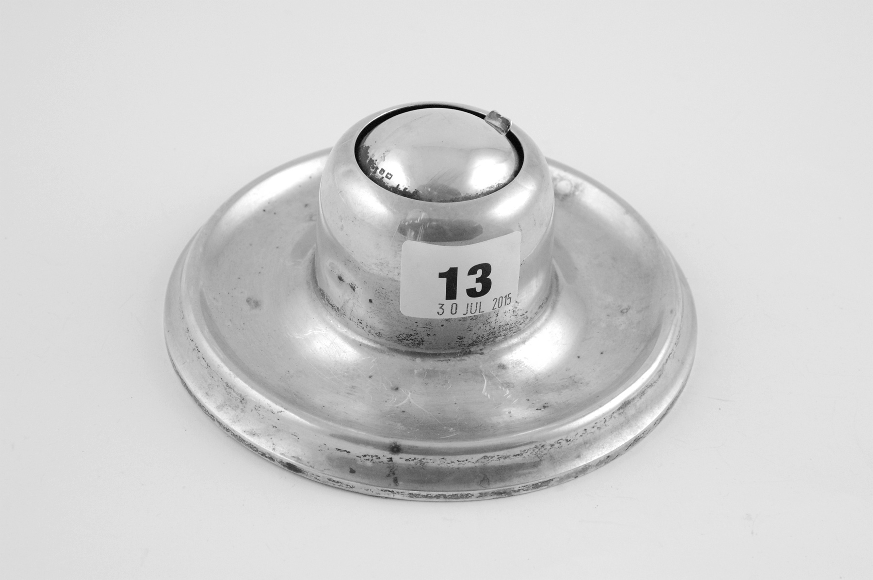 Silver ink pot of capstan type with pivoting turn over cap, Birmingham, 1915.