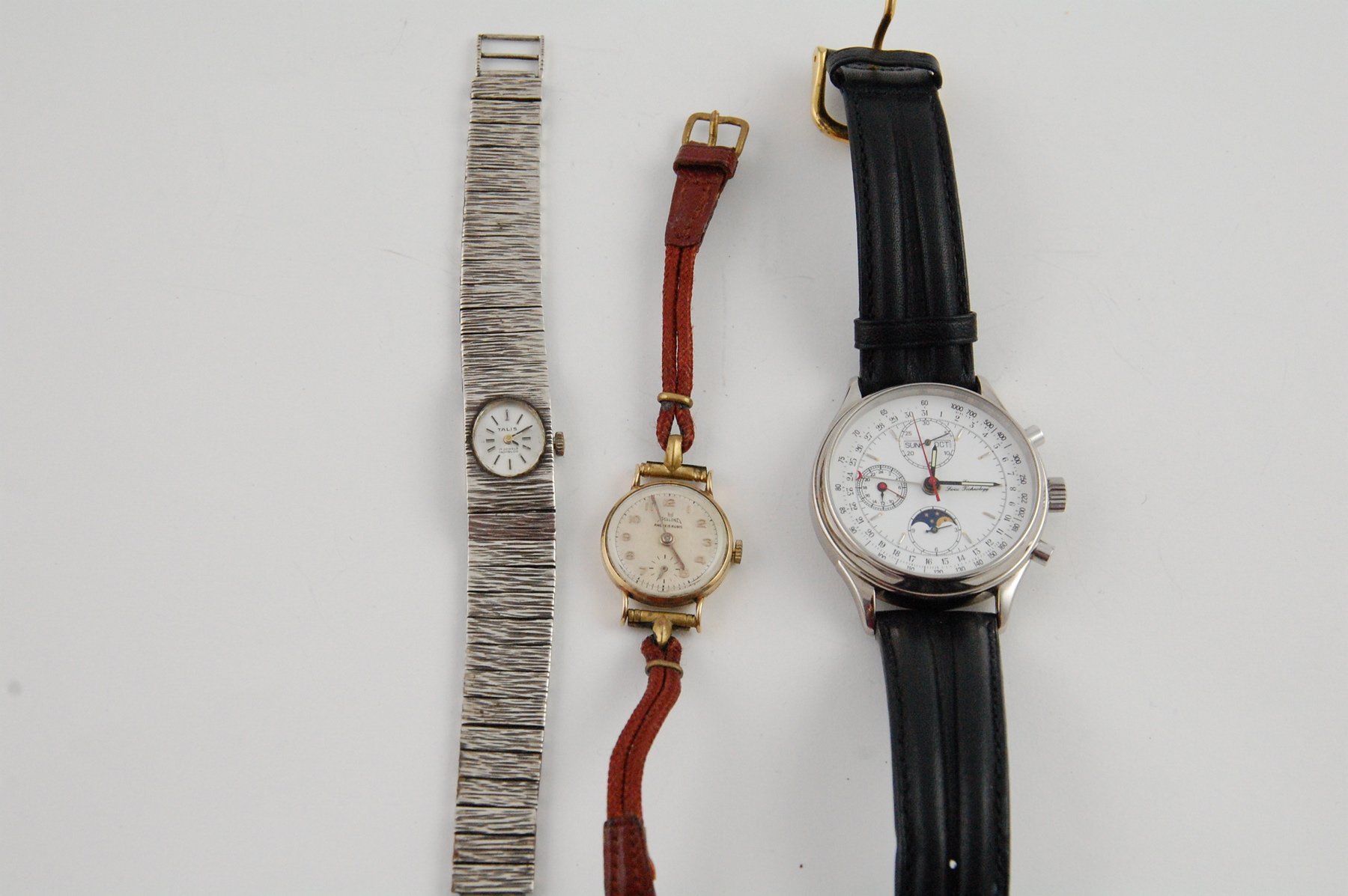 Lady's 9ct gold wrist watch, 1950; a silver bracelet watch & a gent's ETA automatic wrist