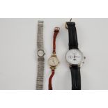 Lady's 9ct gold wrist watch, 1950; a silver bracelet watch & a gent's ETA automatic wrist