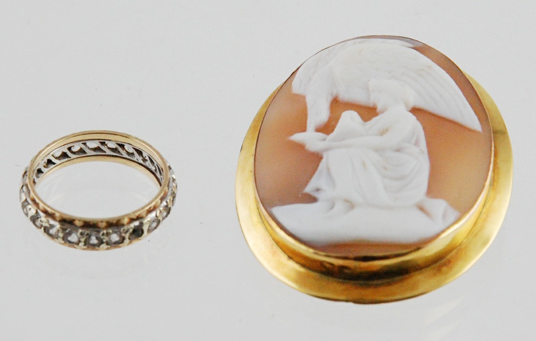 Cameo brooch carved with Leda & the swan, in gold '9ct' & a spinel eternity ring, 9ct gold.