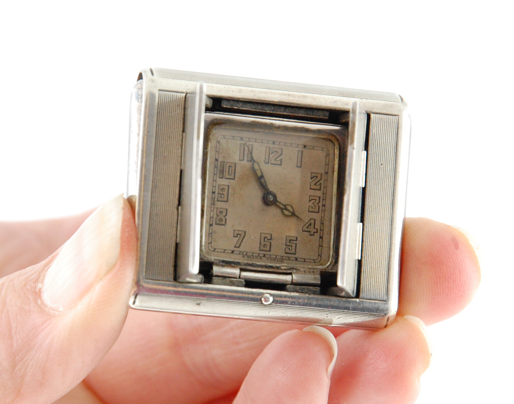 Tavannes golfer's silver watch with silvered dial in rectangular engine turned case with sprung