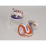Two Royal Crown Derby paperweights, frog on a pad, 3" diam. & dragon, 5" long.