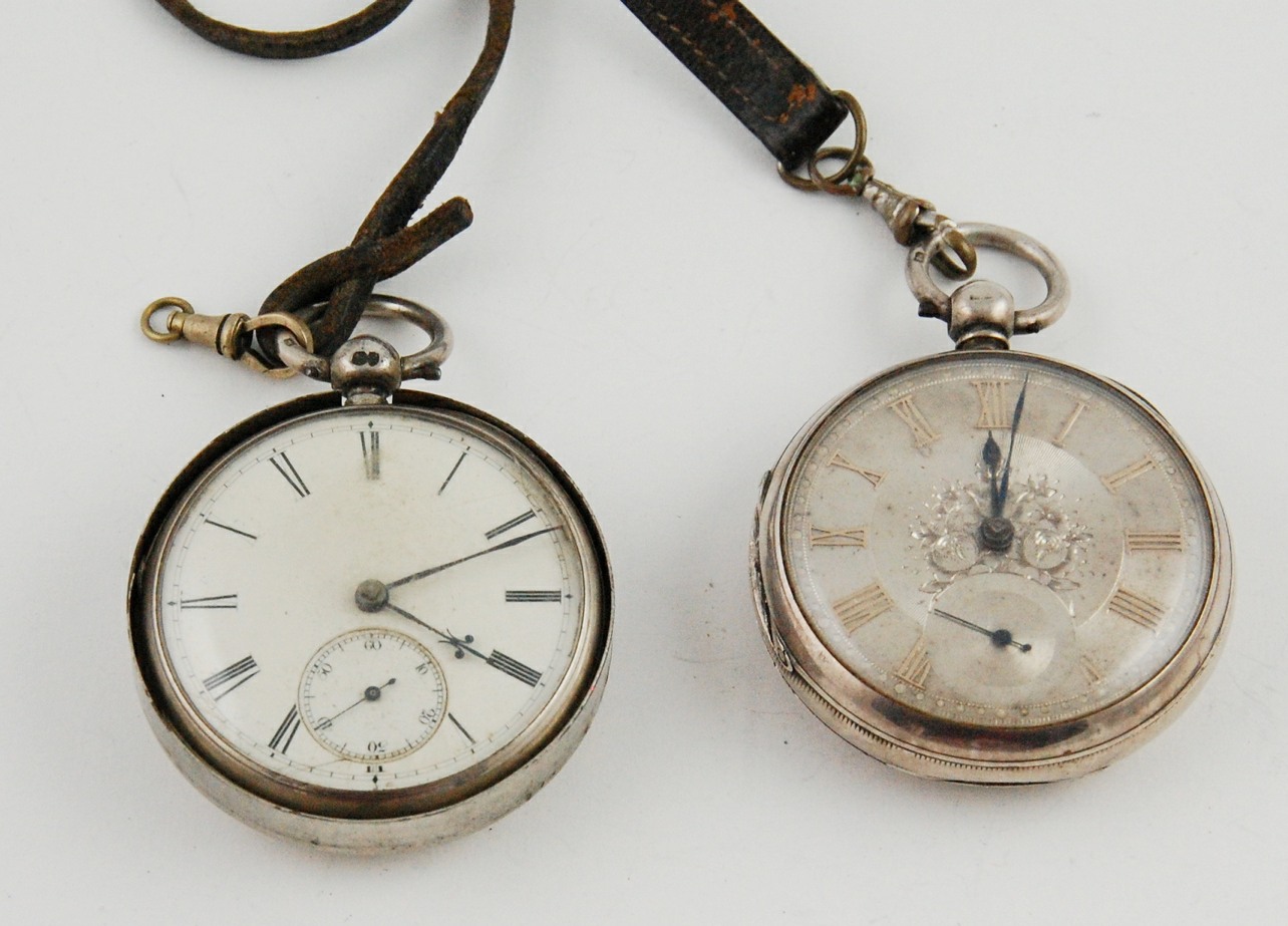 Lever watch in open face case, 1880 & another with silver dial, 1884.