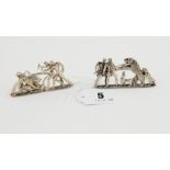 Pair of silver collapsible menu holders, one with pierced scenes of figures & a bear,
